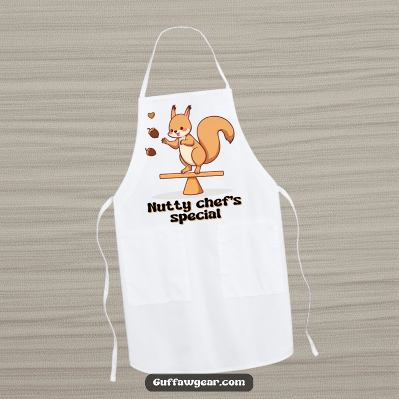 Funny apron with a squirrel juggling acorns while balancing on a teeter-totter, great for cooking and kitchen enthusiasts.