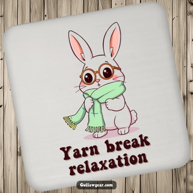 Funny Rabbit Coaster: A humorous illustration of a rabbit in a monocle comically knitting a scarf that is too long.