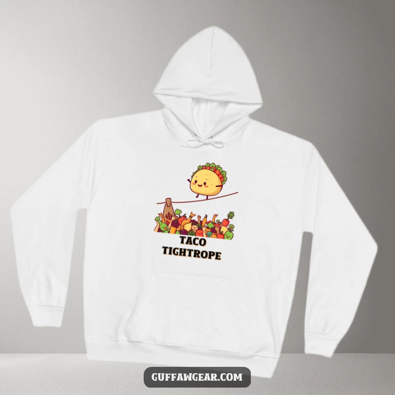 Funny Hoodie with a smiling taco on a tightrope above cheering vegetables, a cozy and humorous piece.